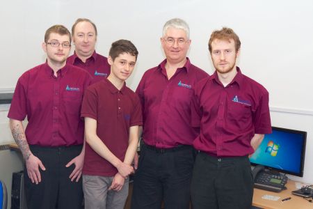 Pictured l-r: Employees Tom Ashman, Andy Cordey, Jack Bowie (work experience), MD John Williams and Matt Brooks of atchway-based IT company Absolutely PC
