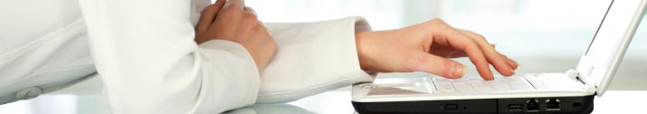 A close up of someone using a laptop