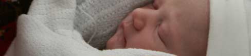 A newborn baby.