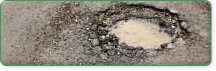 Road with pothole